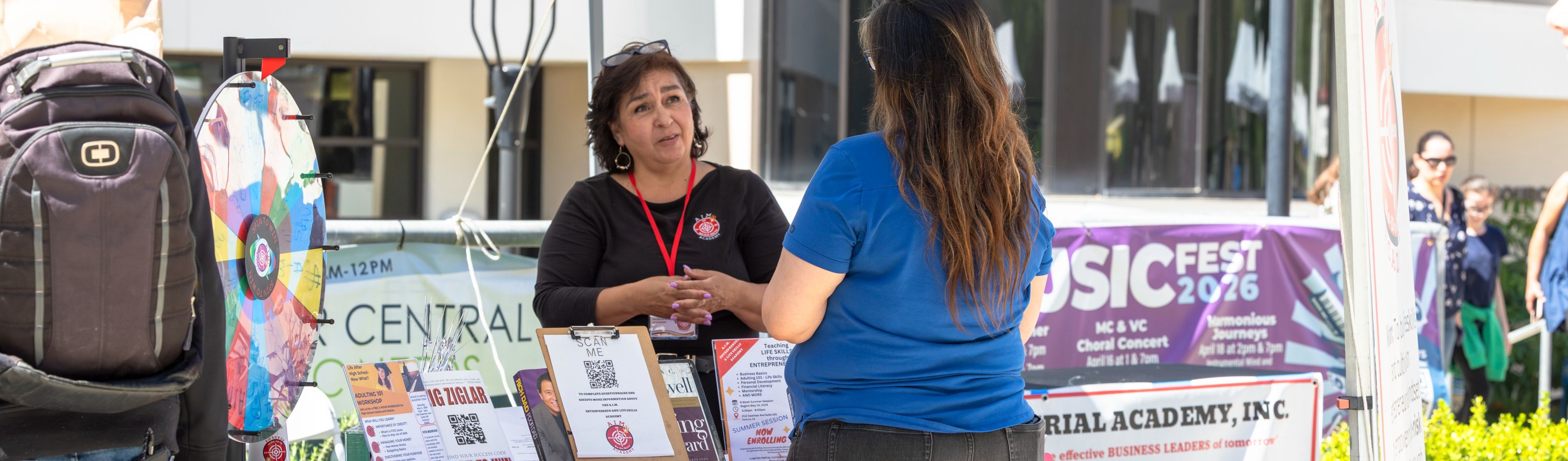 A student talking to an employer at the 2026 Career Fair