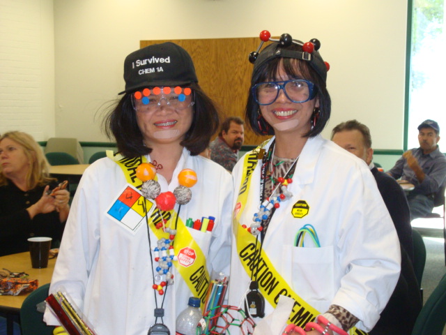 Staff dressed in costume for Halloween Potluck
