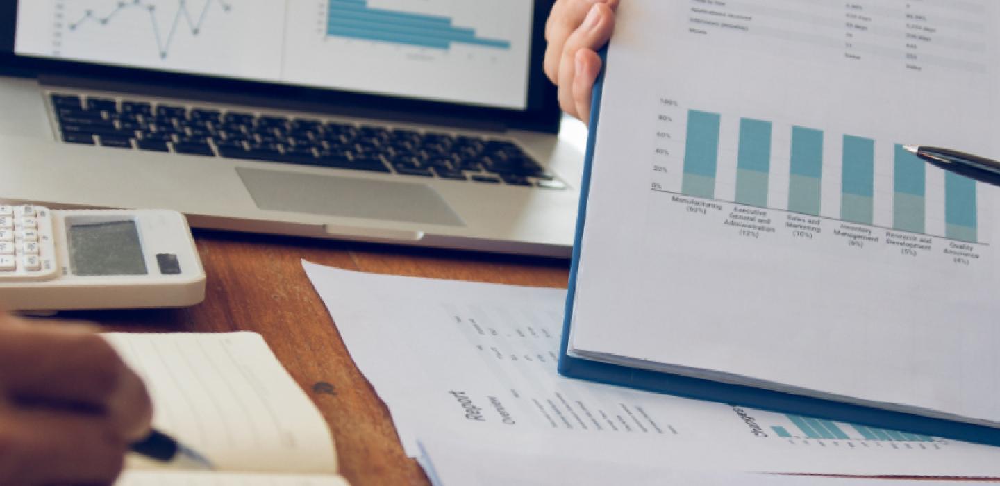 close up of economic charts and papers