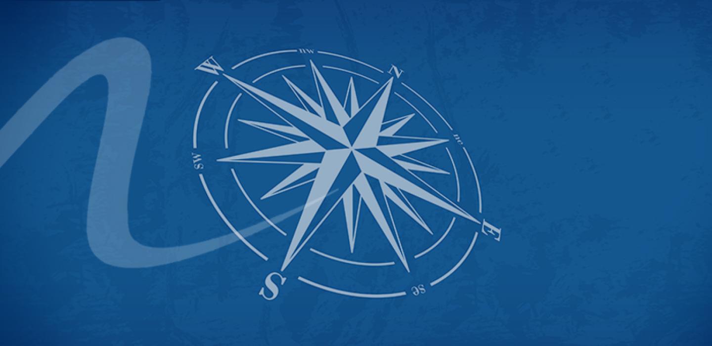 Compass on blue background